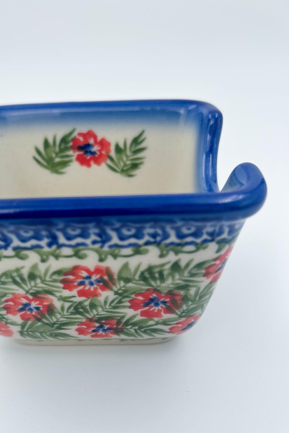 Polish pottery hand made  3” rectangular sugar packet holder in Happiness Pattern.
Ceramika Bona Company