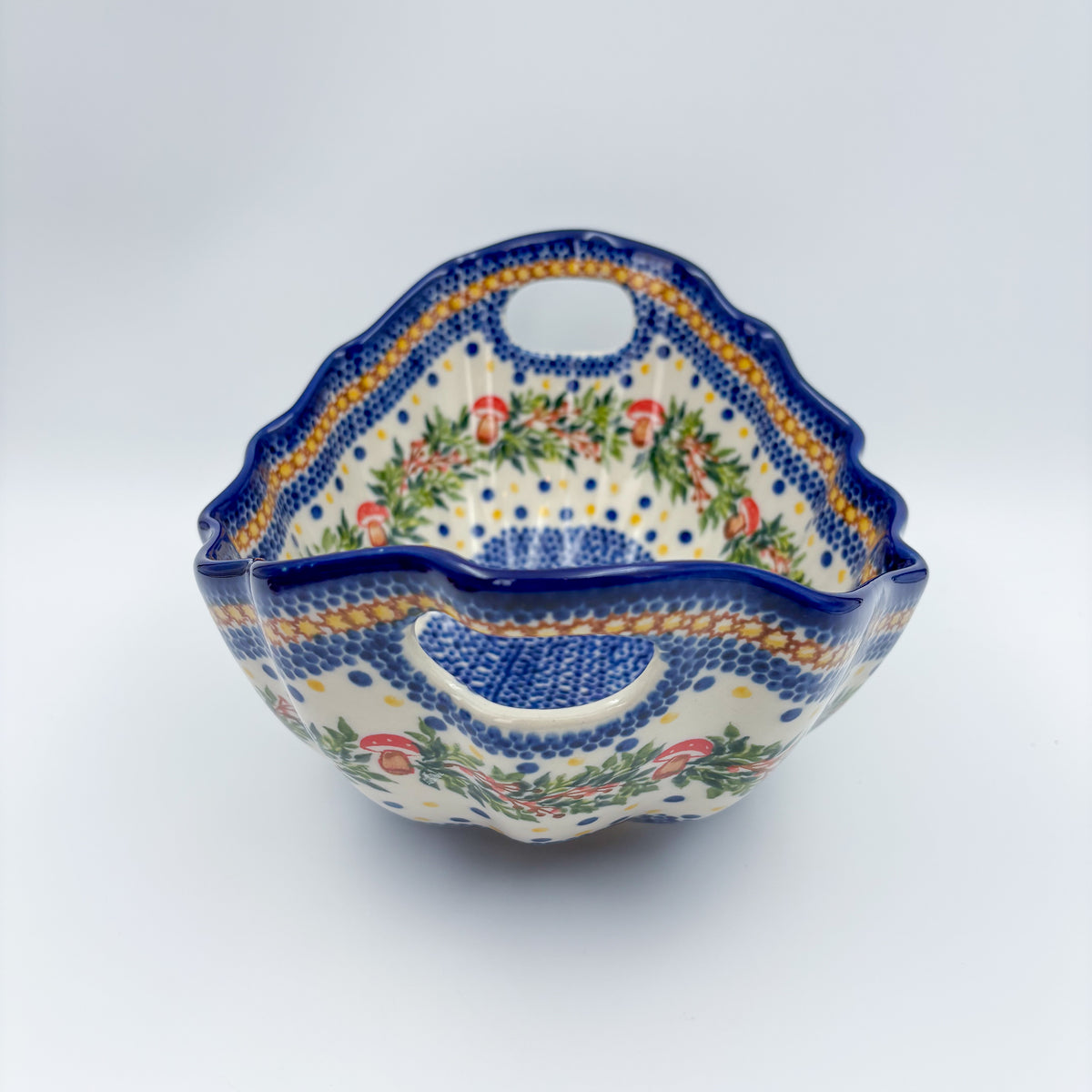 UNIKAT Mushroom Pattern Lodka bowl with handles, front view showing scalloped handles and mushroom wreath