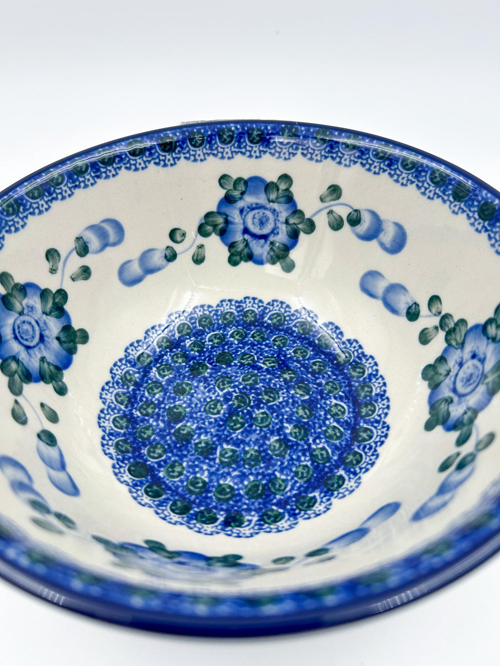 Blue Poppies stacking bowl, angled front view showing full interior pattern
