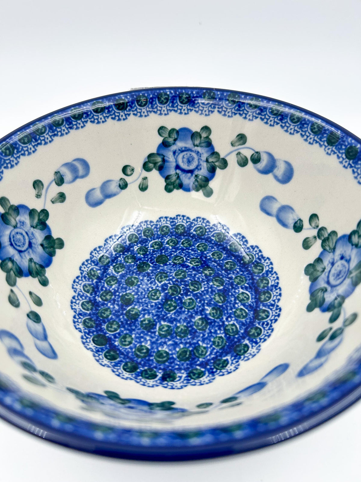 Blue Poppies stacking bowl, angled front view showing full interior pattern