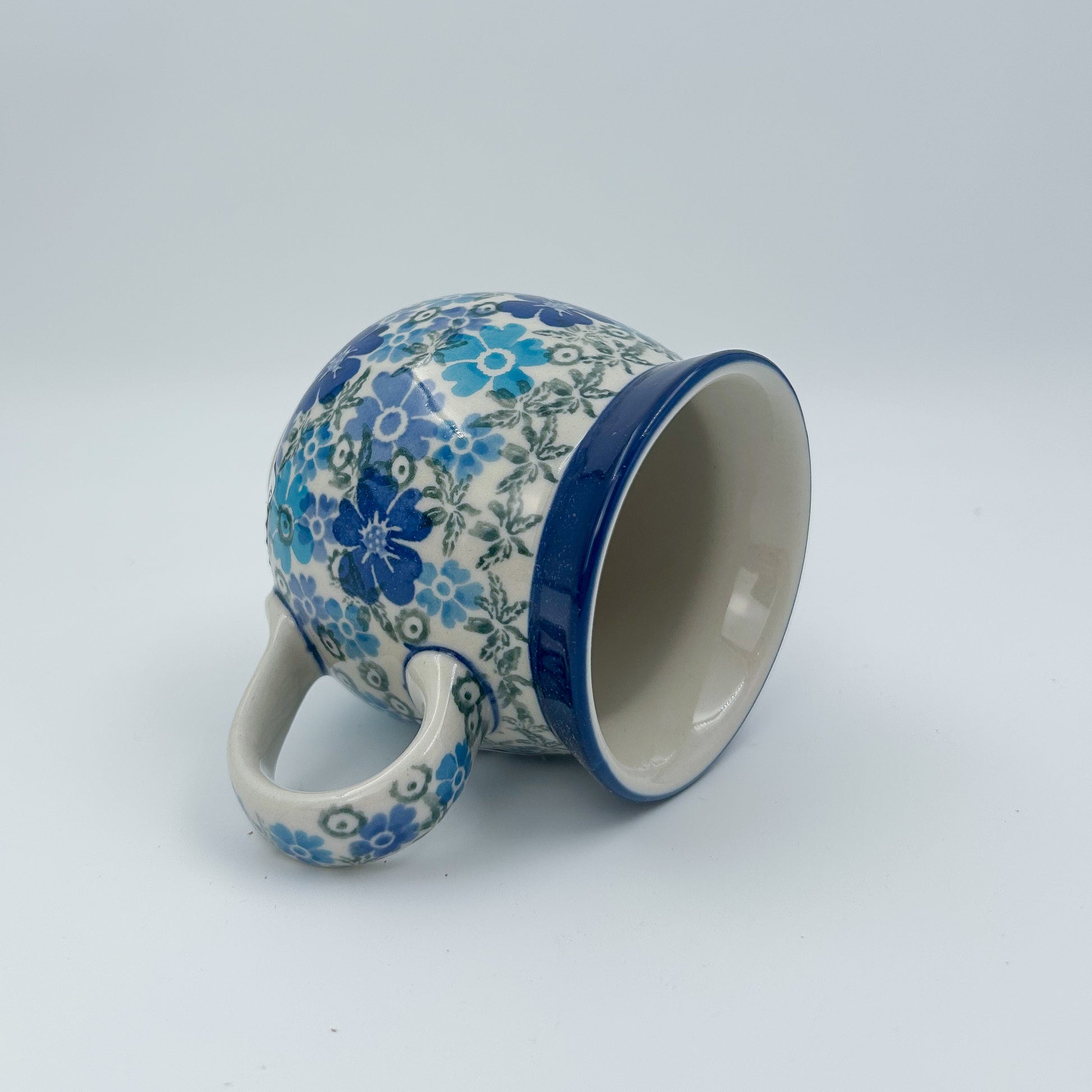12 oz Polish Pottery UNIKAT bubble mug is made by talented artisans from Poland UNIKAT Fields of Blue Design. Ceramika Artystyczna Company