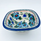 Evangeline square bowl, angled top-down view showing full pattern