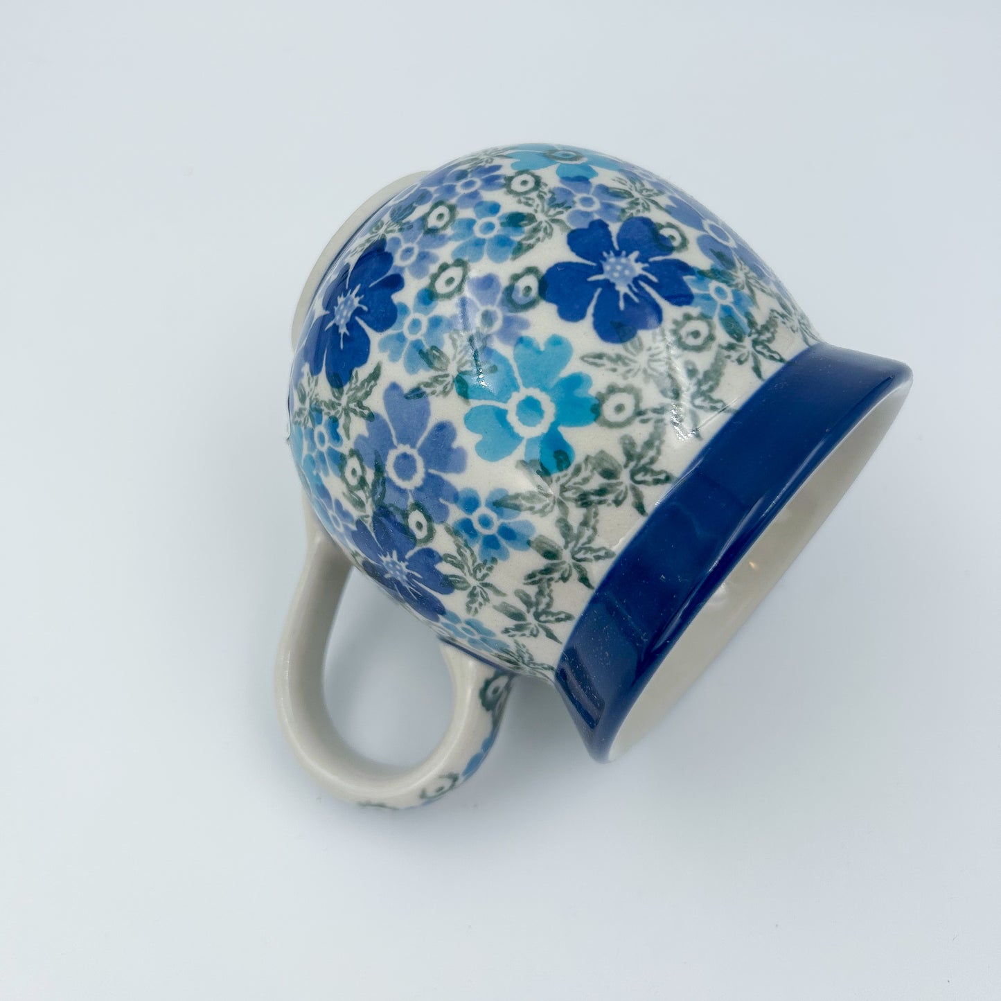 12 oz Polish Pottery UNIKAT bubble mug is made by talented artisans from Poland UNIKAT Fields of Blue Design. Ceramika Artystyczna Company