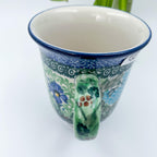 Top-down view into Spring Garden bistro mug showing cream interior and handle