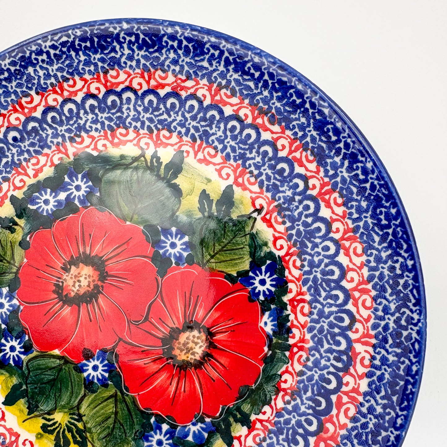 7.5” Plate.  Hand crafted Polish pottery stoneware: UNIKAT Red Finesy Design