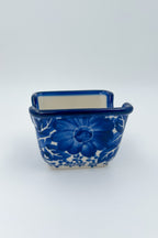 Polish pottery hand made  3” rectangular sugar packet holder in Happiness Pattern.
Ceramika Bona Company