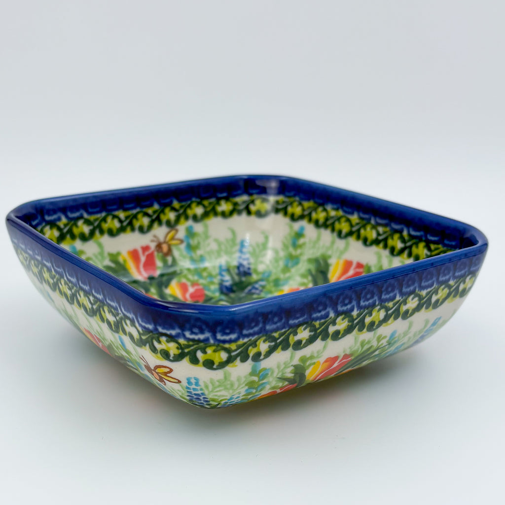 Tulips and Bees square bowl on white background, angled front view