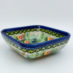 Tulips and Bees square bowl on white background, angled front view