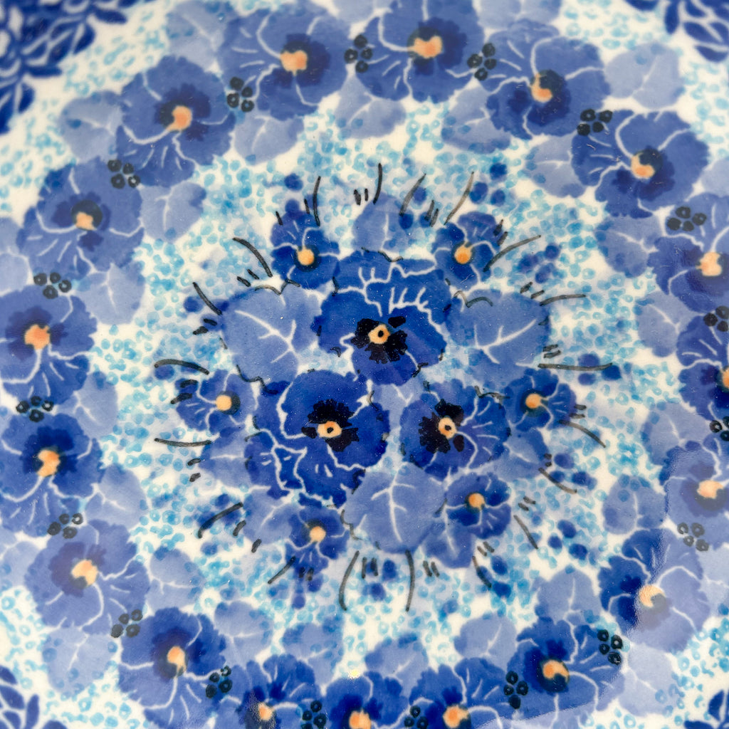 Close-up of pansy medallion center on Deep Winter scalloped bowl