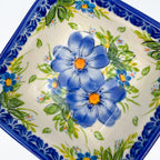 Close-up of daisy pattern on Blue Daisy square bowl