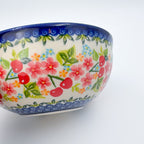 Cherry Blossom bowl, side view showing exterior cherry pattern