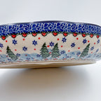 Dancing Snowman chip and dip platter, exterior side view showing pine trees and heart-dot border pattern