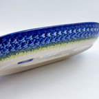 UNIKAT Bluebell Meadow oval platter, exterior side view showing bottom edge and mosaic rim pattern