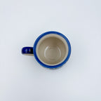 Top-down view into Blueberry bubble mug showing cream interior and handle
