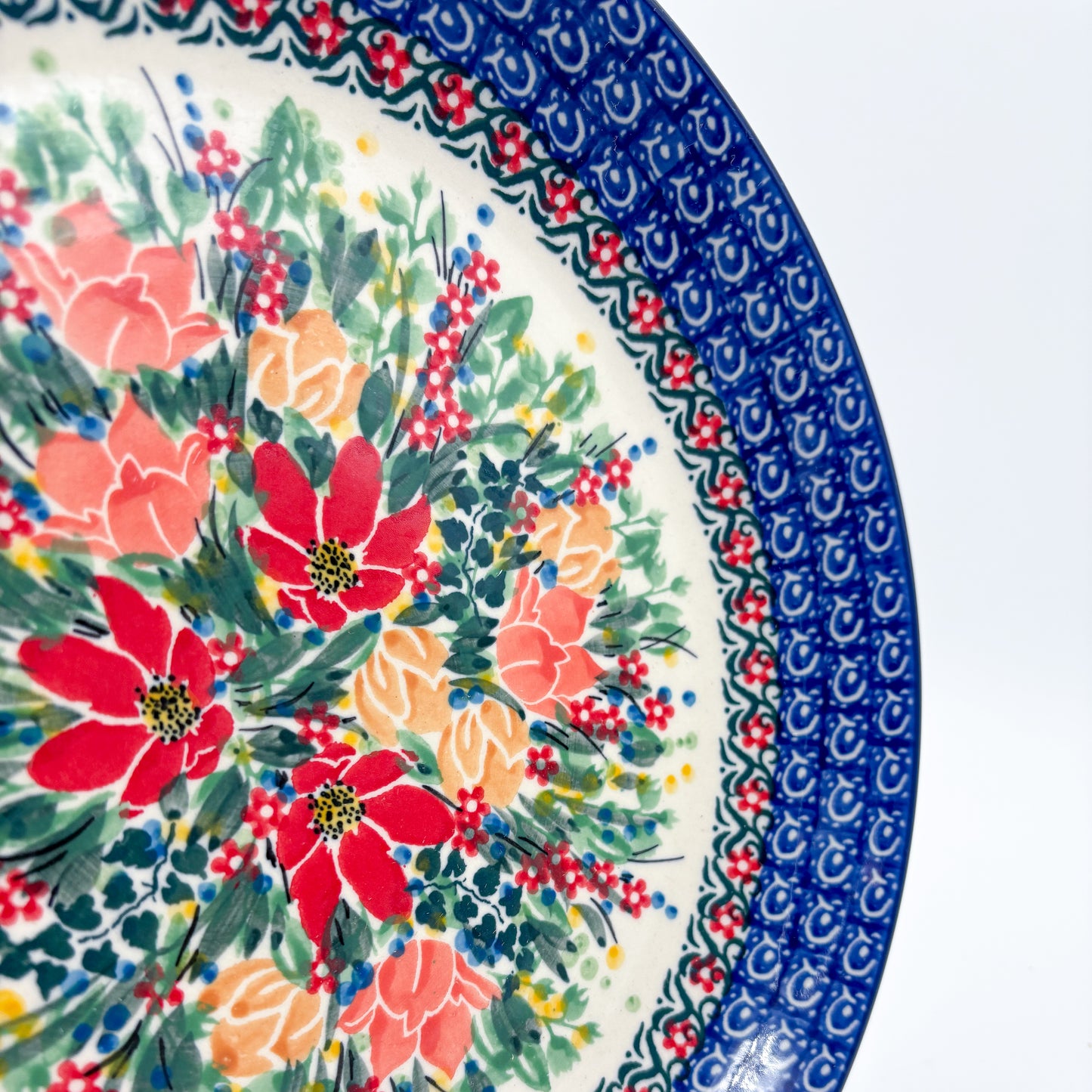 10.5” Plate.  Hand crafted Polish pottery stoneware: UNIKAT Red and Yellow Flowers Design