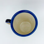 Top-down view into Hedgehog and Pumpkins Viking mug showing interior and handle