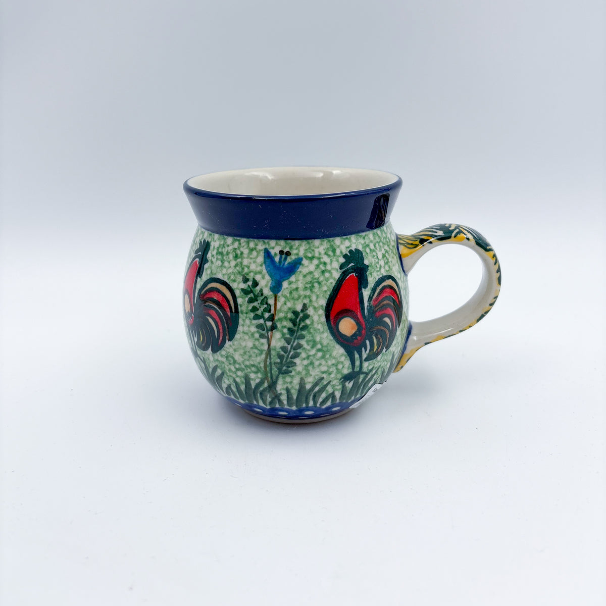 Rooster Parade bubble mug on white background, front view