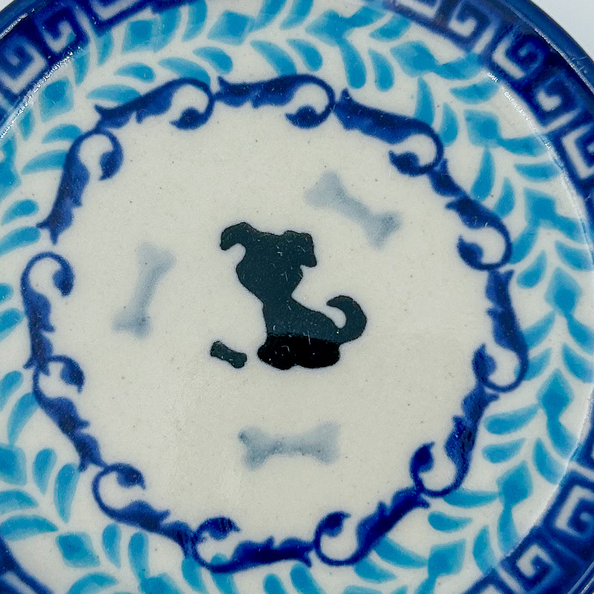 4” puppy plate is a handmade by talented Polish artisans. This small roundpuppy plate is a dachshund image is simple adorable. 4" Round Ceramika Bona Company