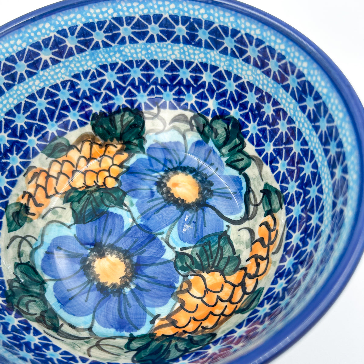 Close-up of interior floral medallion on Corn in the Blue deep bowl