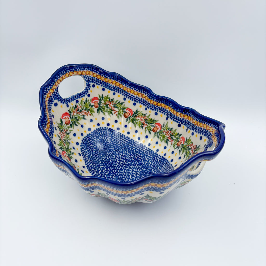 UNIKAT Mushroom Pattern Lodka bowl with handles, angled top-down view of mushroom wreath and blue dotted well