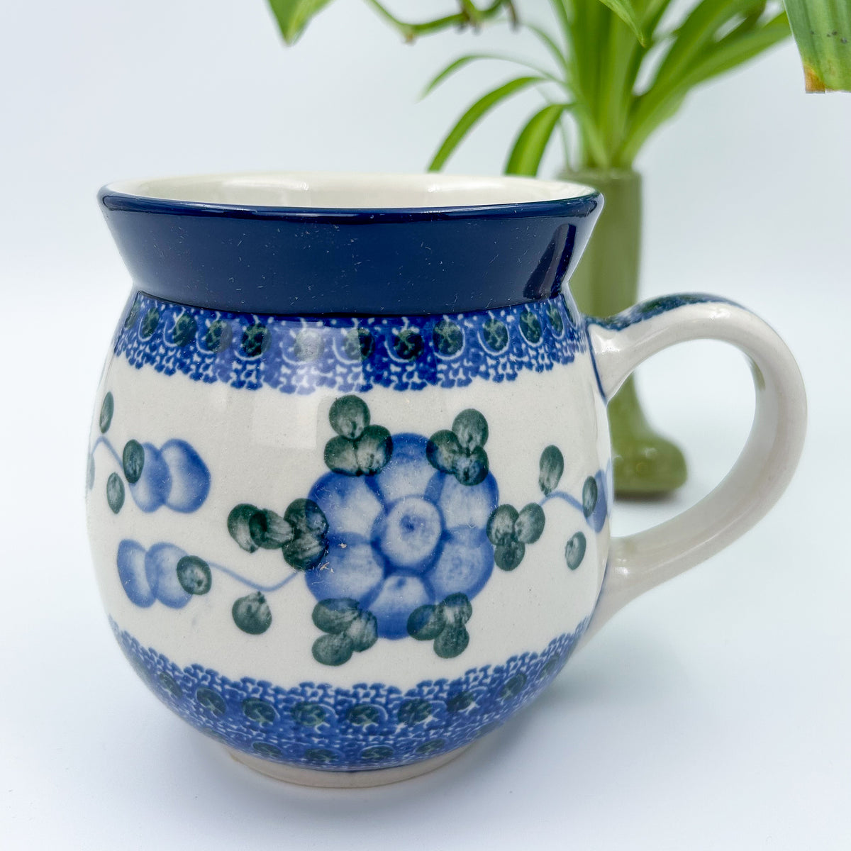 This 12 oz Polish Pottery ceramic floral bubble mugolds 12 ounces of fluid.
Ceramika Artystyczna Company
