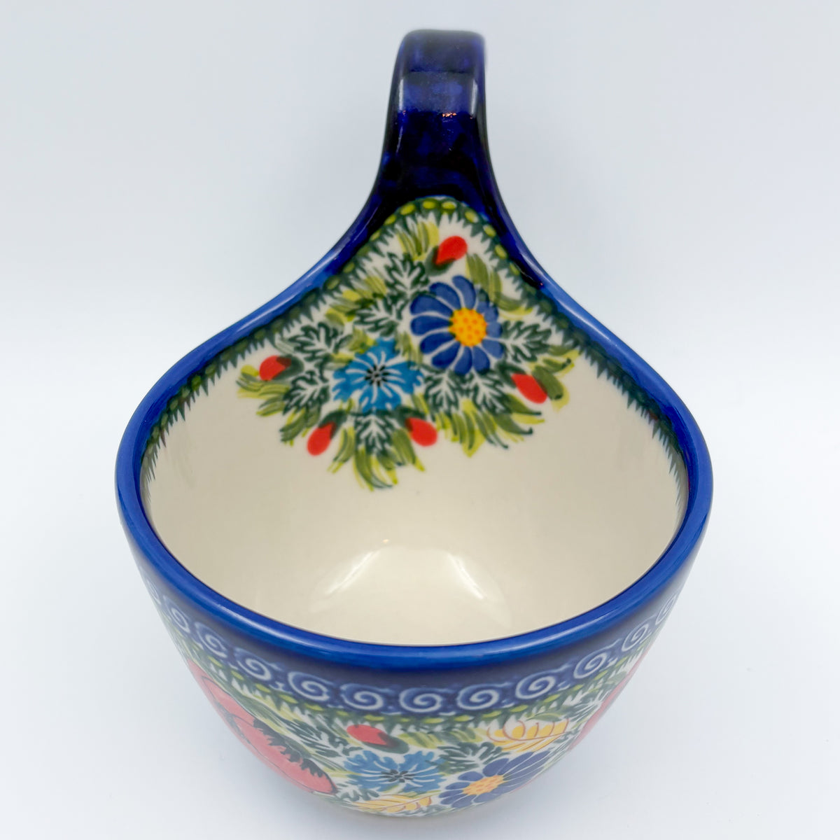 Garden Poppy loop-handle bowl mug, front view showing interior bouquet and handle