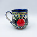 Fowls in Florals bubble mug on white background, front view showing guinea fowl and red flower