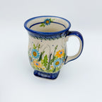 Wildflower Meadow tulip mug, three-quarter view showing painted flower inside rim