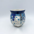 Morning Glory bubble mug on white background, angled view with handle