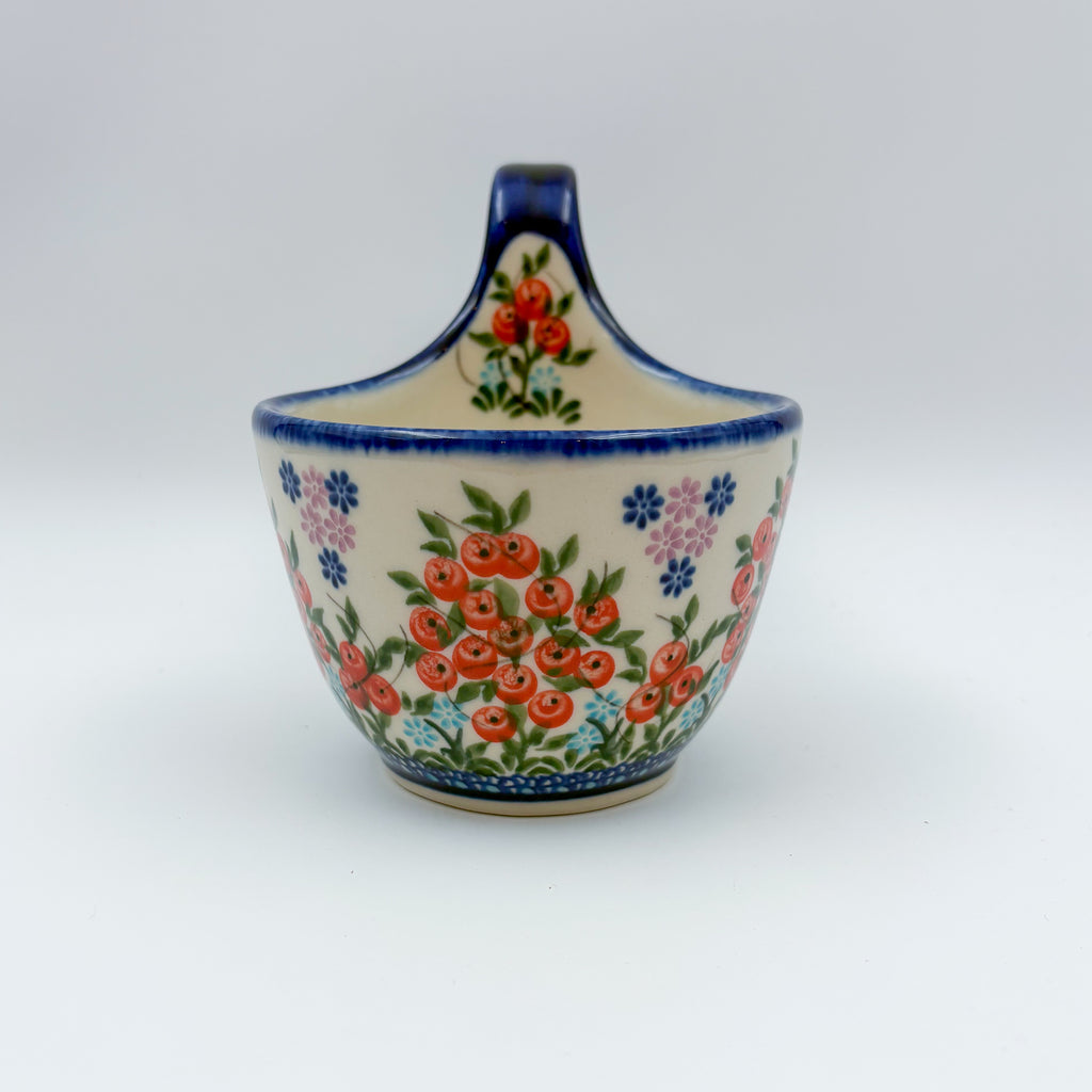 Red Berry loop-handle bowl mug on white background, front view
