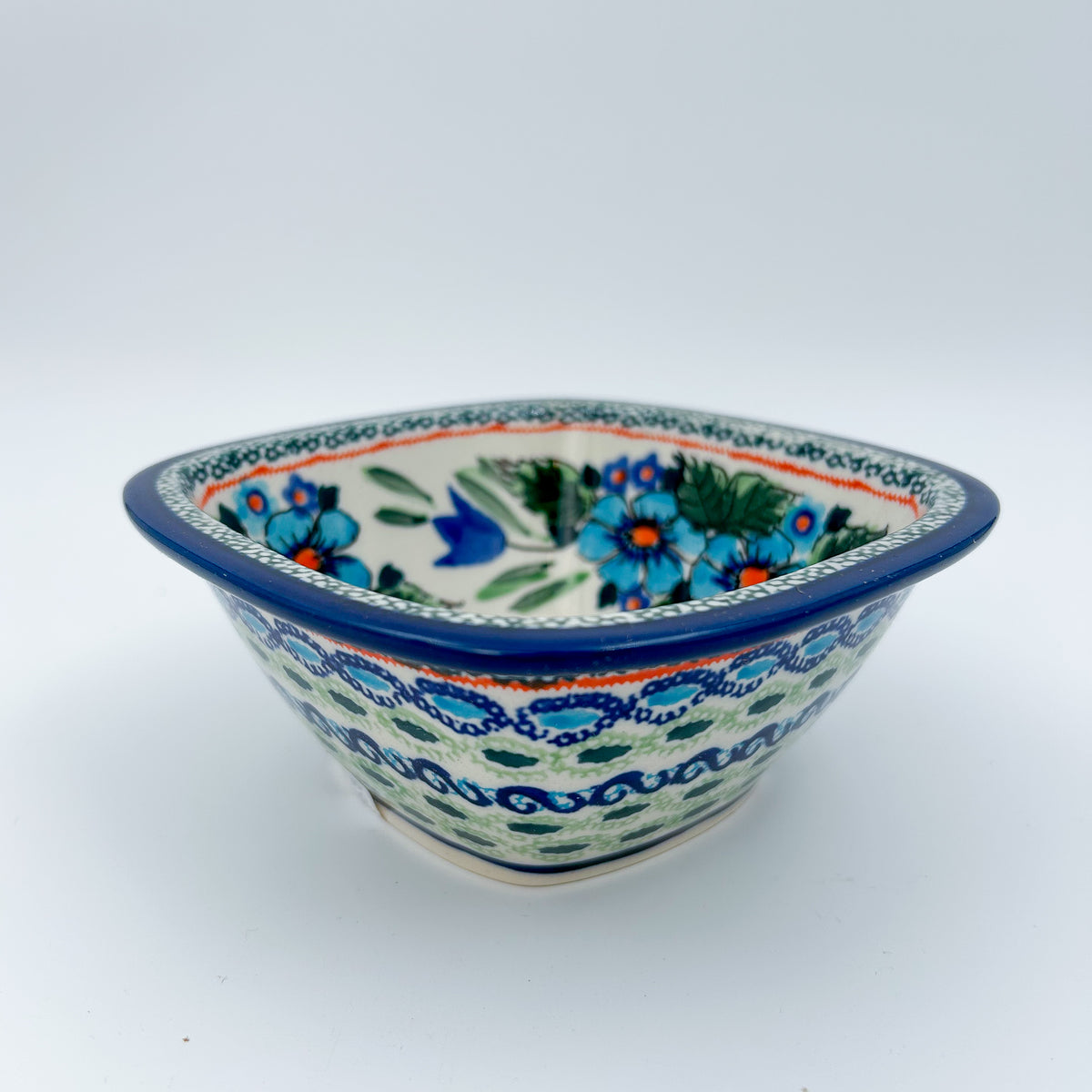 Evangeline square bowl, angled front view showing blue floral pattern