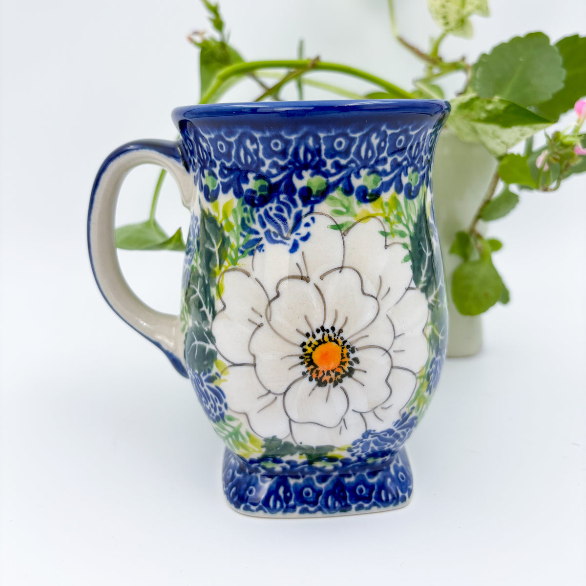 Wild Rose tulip mug on white background, front view showing painted rose bloom