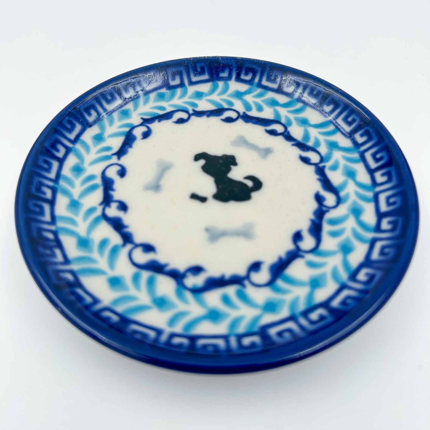 4” puppy plate is a handmade by talented Polish artisans. This small roundpuppy plate is a dachshund image is simple adorable. 4" Round Ceramika Bona Company