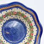 Mushroom Design wavy bowl, close-up top view of blue dotted center with mushroom wreath detail