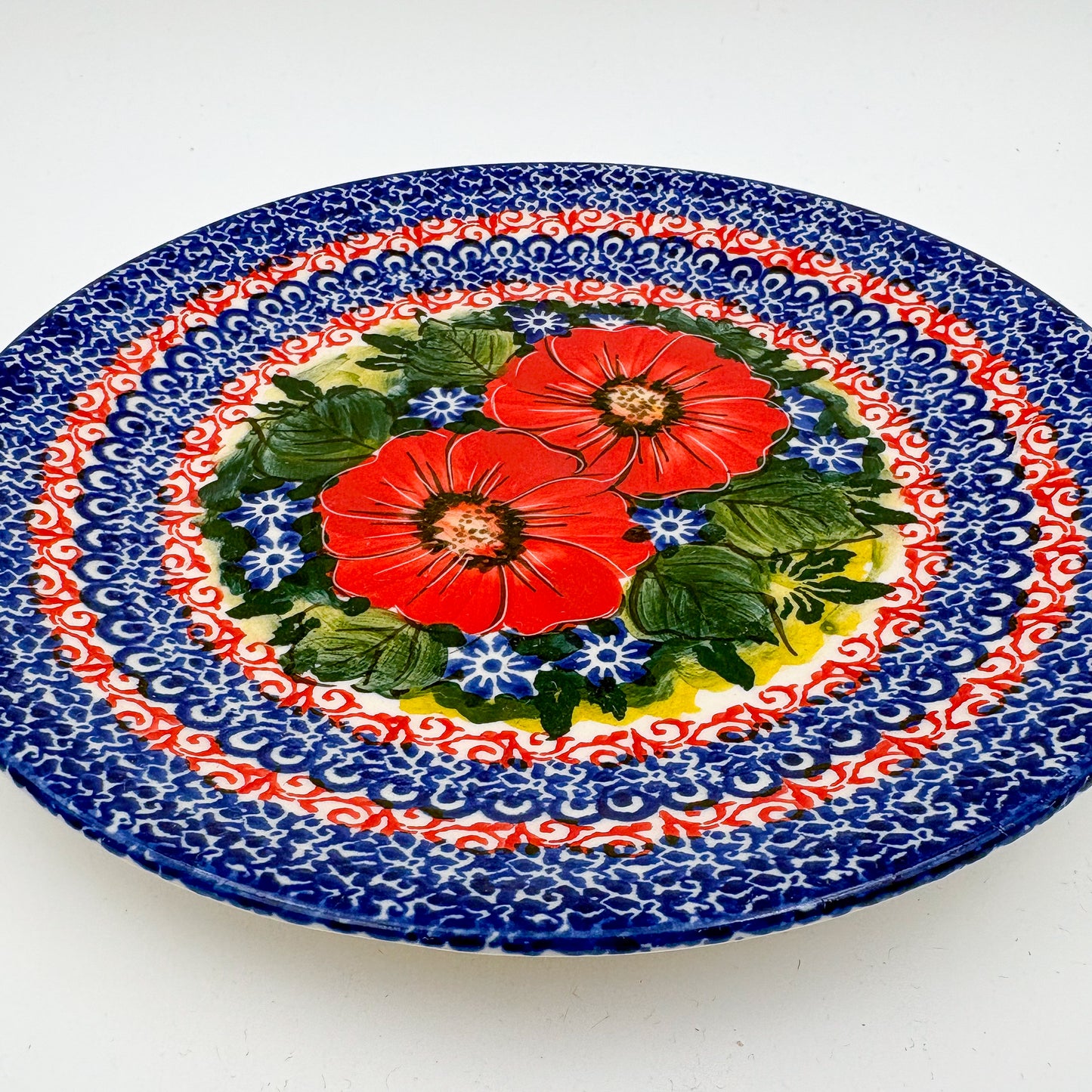 7.5” Plate.  Hand crafted Polish pottery stoneware: UNIKAT Red Finesy Design