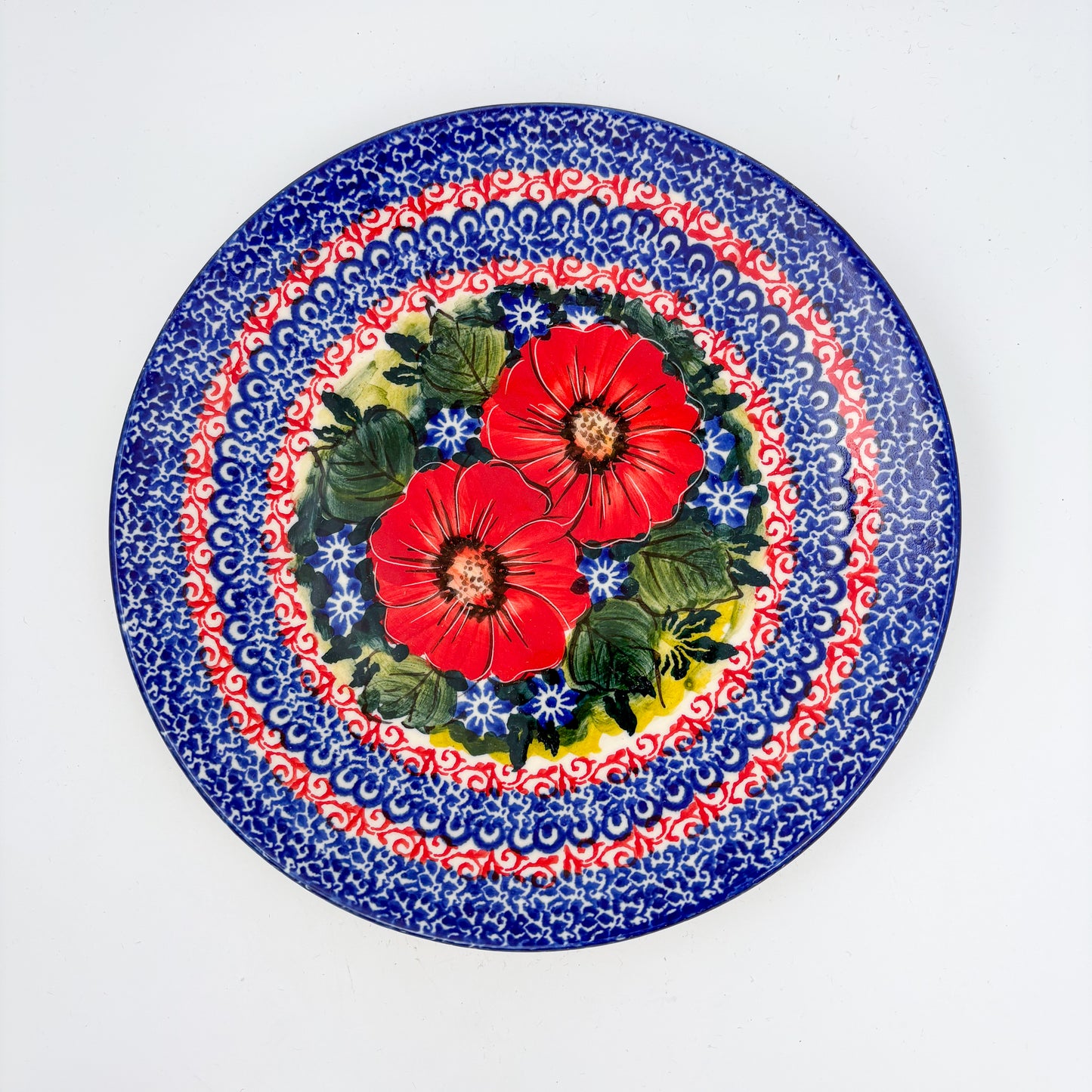 7.5” Plate.  Hand crafted Polish pottery stoneware: UNIKAT Red Finesy Design