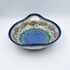 Cottage Garden handled bowl on white background, angled view showing handle
