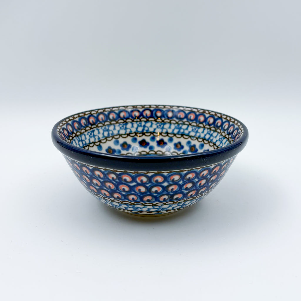 UNIKAT Cobalt Poppies bowl, front view showing peacock feather scale pattern on exterior