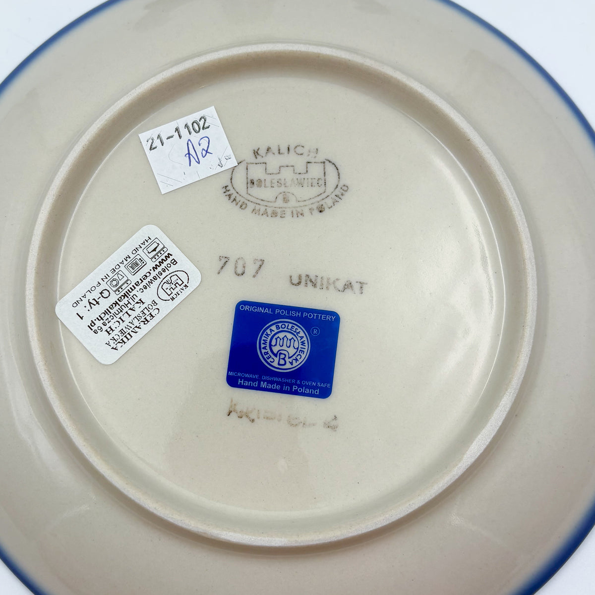 UNIKAT Snowdrop Garden plate, bottom stamp with Kalich Boleslawiec Unikat mark