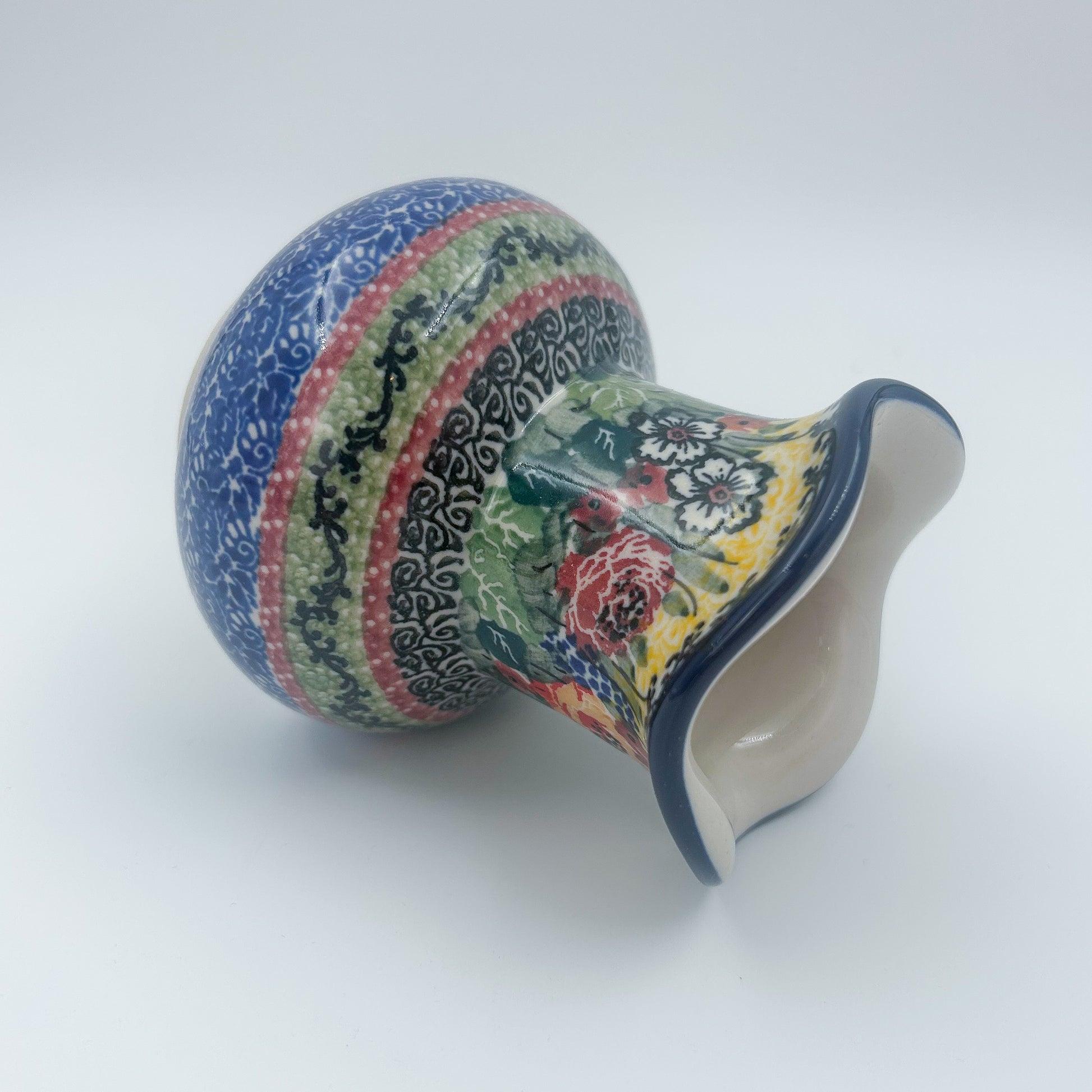 This 4” floral vase is a handmade by talented Polish artisans. This is a Polish UNIKAT signature vase.Dimensions 4.33 X 3.35 X 3.35
Ceramika Artystyczna Company