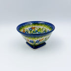 Bluebell Meadow small pedestal bowl, front view showing meadow band with bluebell flowers and butterflies