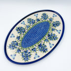 UNIKAT Blueberry oval tray, top-down view of full tray with blueberry clusters and mosaic center