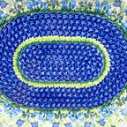UNIKAT Bluebell Meadow XL oval platter, close-up of concentric bluebell mosaic center rings
