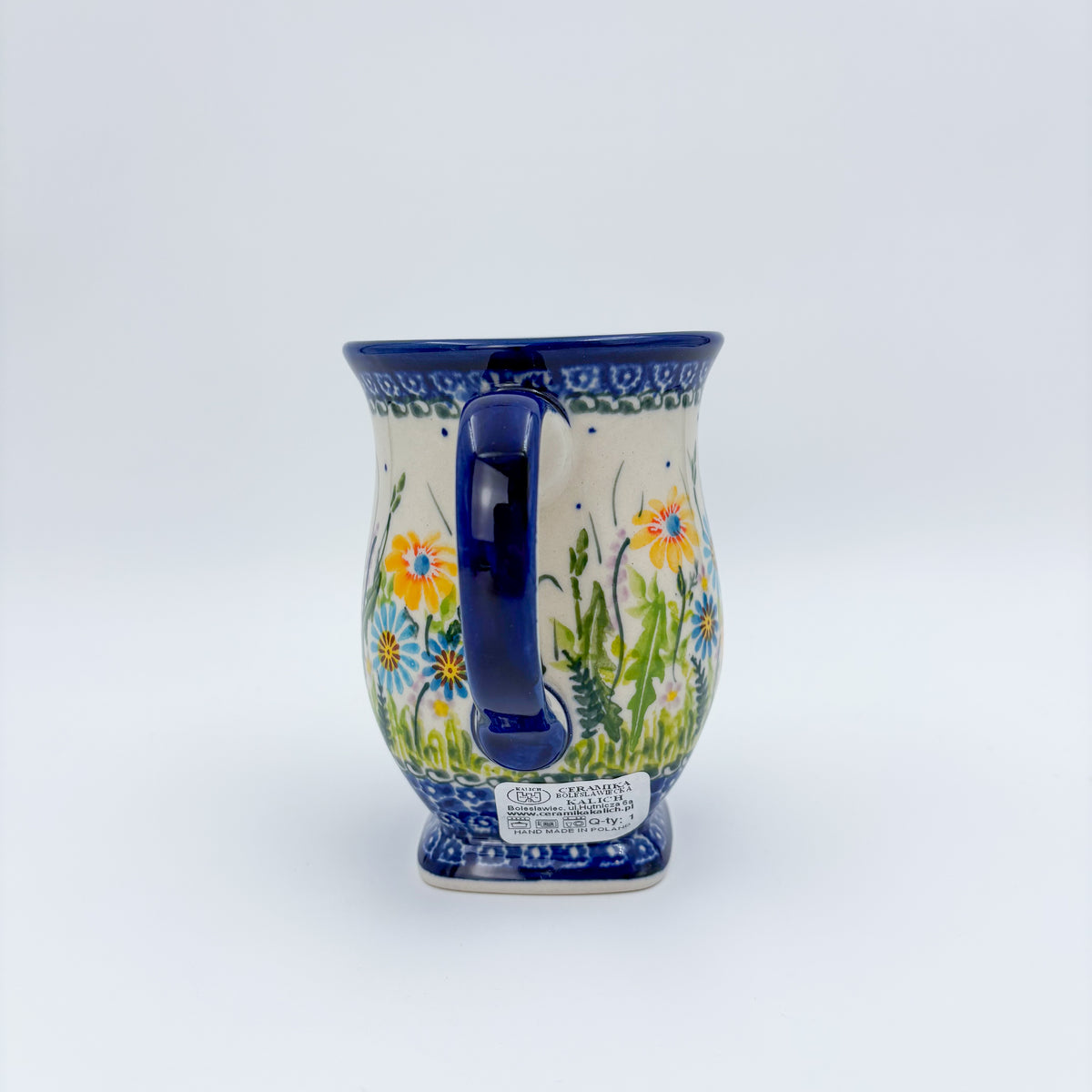 Wildflower Meadow tulip mug, back view showing handle and maker's stamp on base