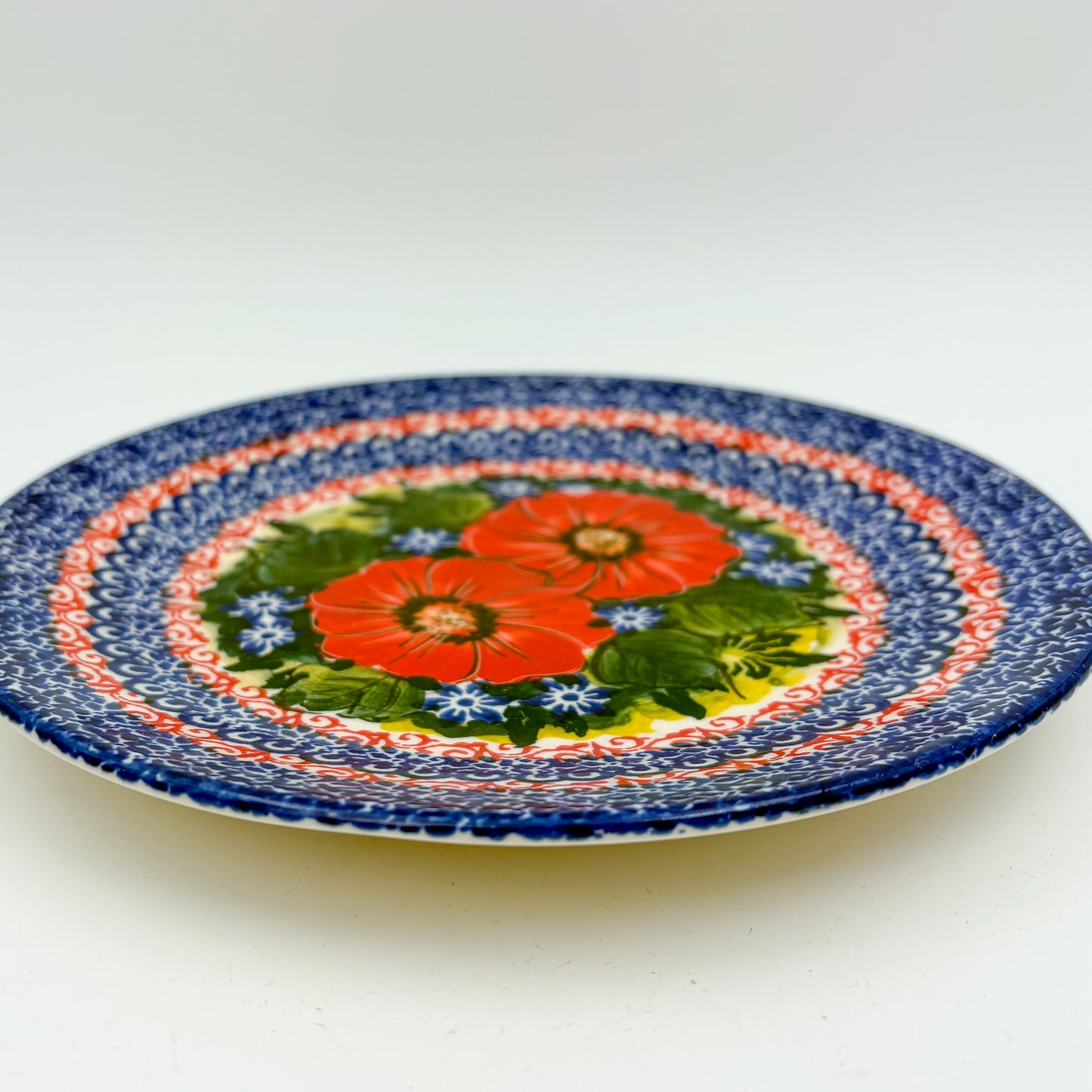 7.5” Plate.  Hand crafted Polish pottery stoneware: UNIKAT Red Finesy Design
