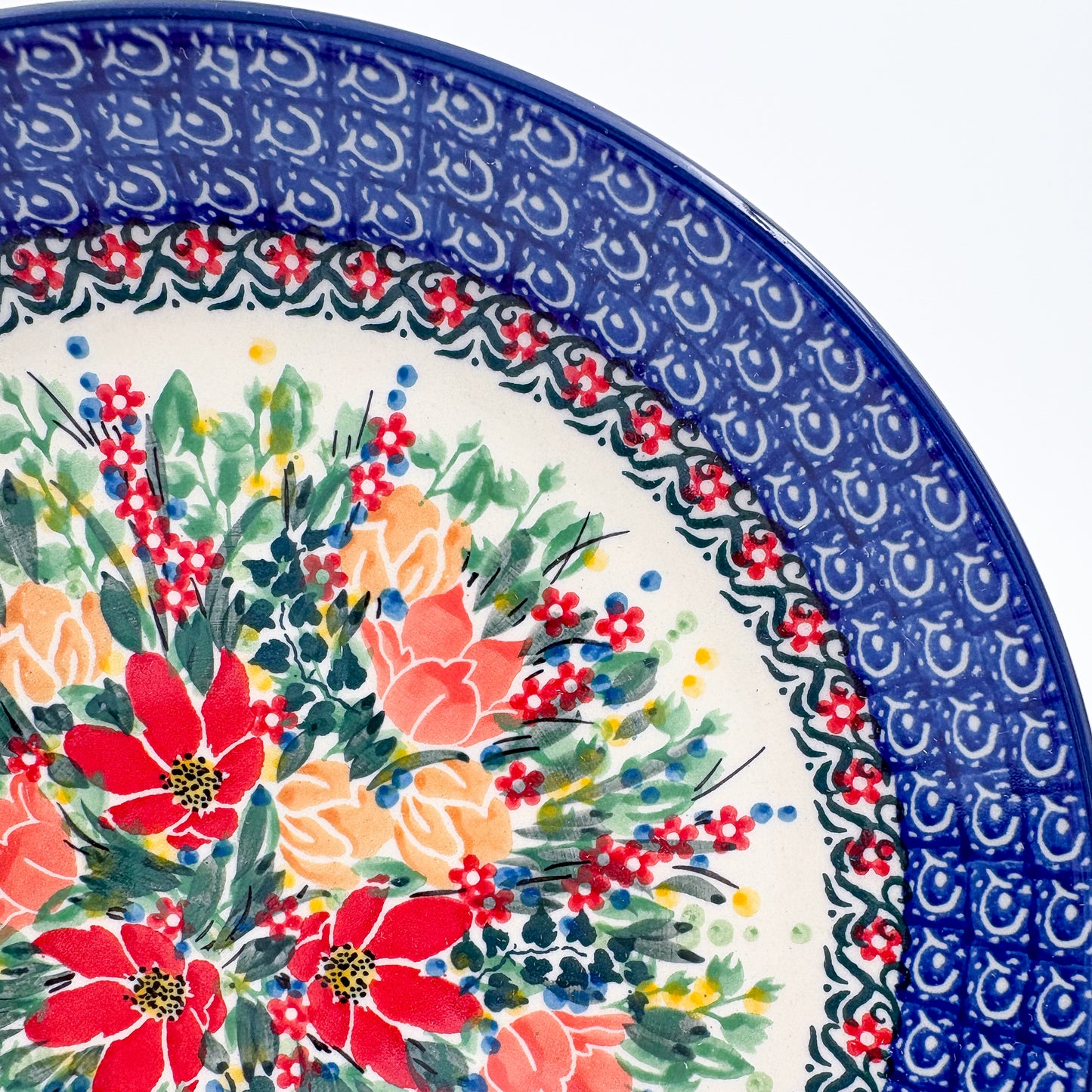10.5” Plate.  Hand crafted Polish pottery stoneware: UNIKAT Red and Yellow Flowers Design