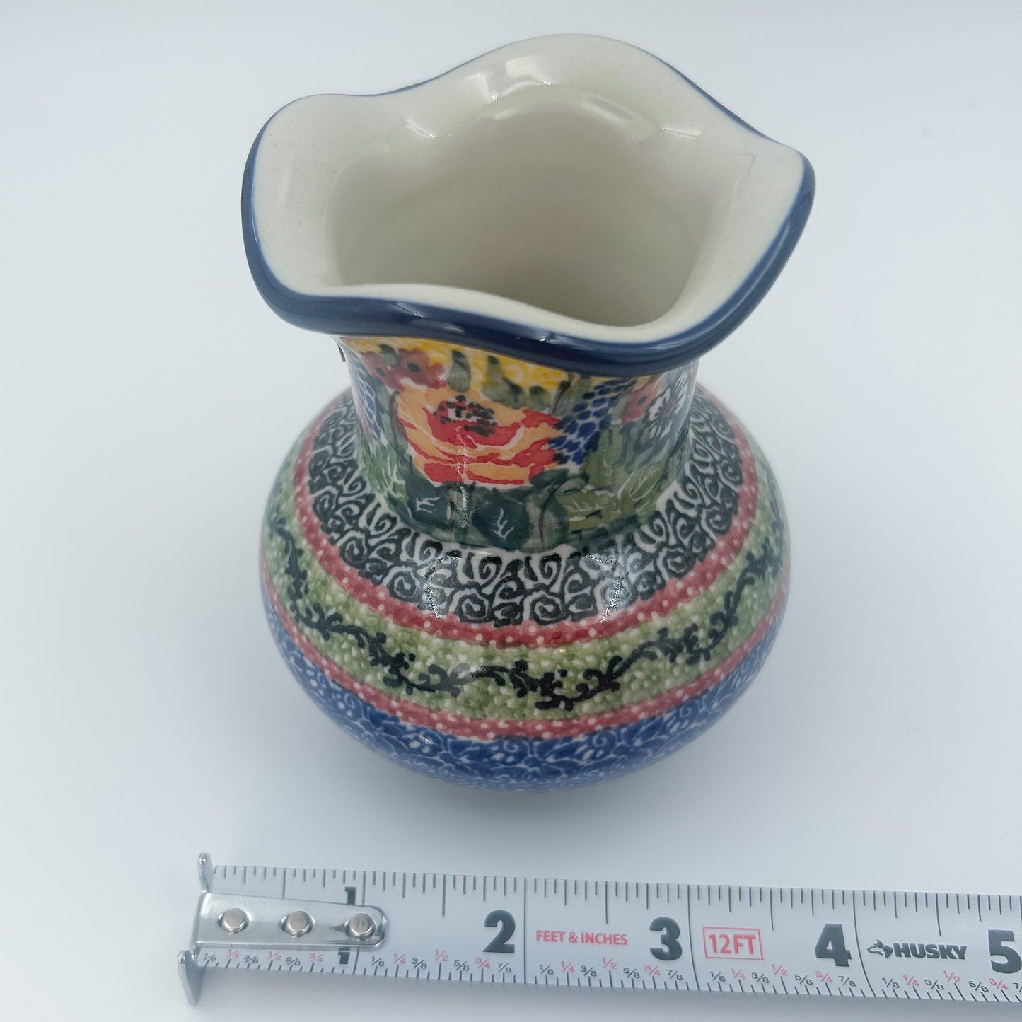 This 4” floral vase is a handmade by talented Polish artisans. This is a Polish UNIKAT signature vase.Dimensions 4.33 X 3.35 X 3.35
Ceramika Artystyczna Company