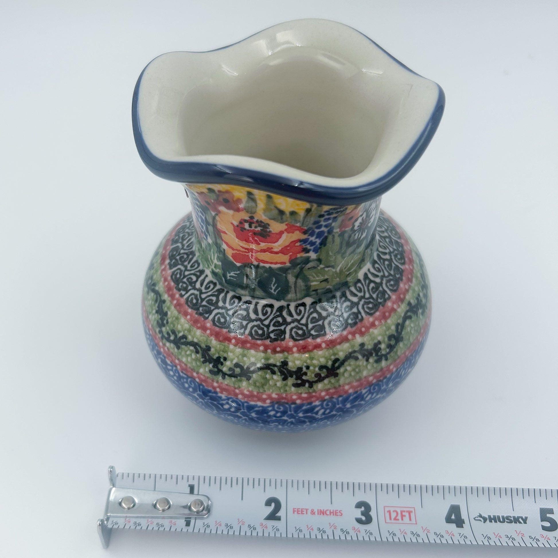 This 4” floral vase is a handmade by talented Polish artisans. This is a Polish UNIKAT signature vase.Dimensions 4.33 X 3.35 X 3.35
Ceramika Artystyczna Company