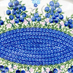 UNIKAT Blueberry oval tray, close-up top-down view of oval mosaic center with blueberries above and below