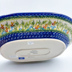 UNIKAT Bluebell Meadow XL oval platter, exterior side view showing bottom stamp and bee-and-bluebell rim
